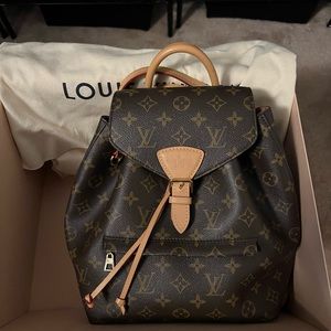 Like new. Barely used Louis Vuitton Montsouris PM